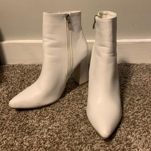 Size 8, white boots. Worn once
